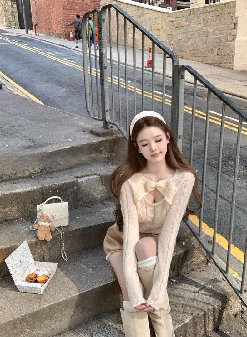 Tue. 妮妮千金 蝴蝶結挖空海馬麻花毛衣 伯爵茶短褲