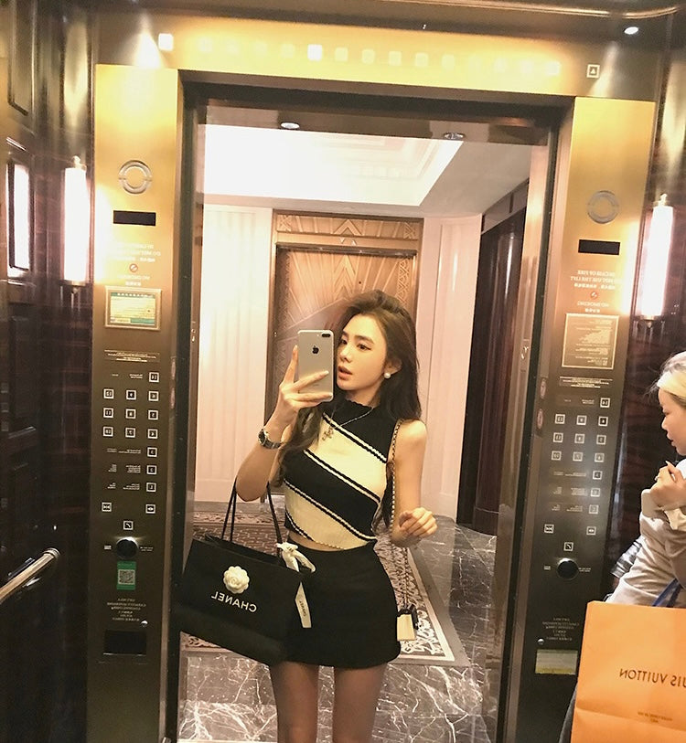 Tue. 旋轉羅紋套頭背心