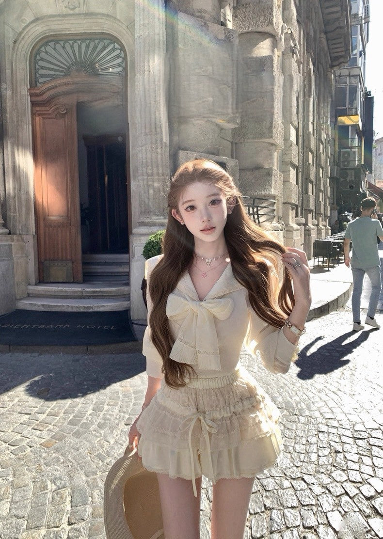 Tue. 卡其圓舞曲手打蝴蝶結翻領襯衫 可愛蛋糕褲裙