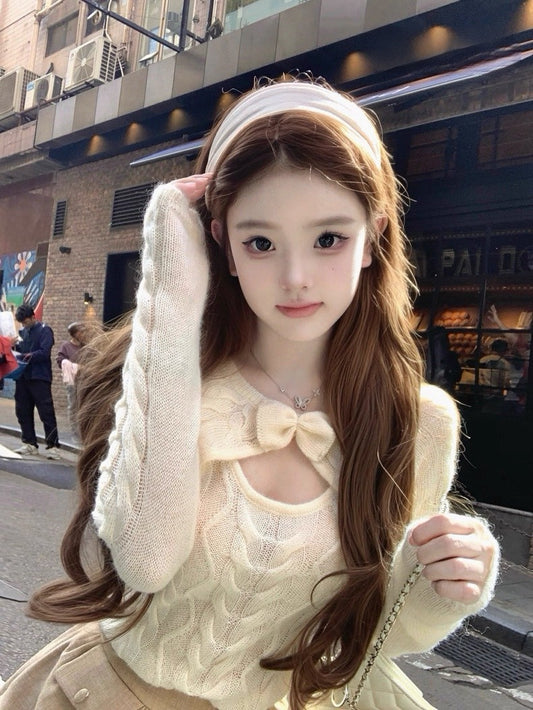 Tue. 妮妮千金 蝴蝶結挖空海馬麻花毛衣 伯爵茶短褲