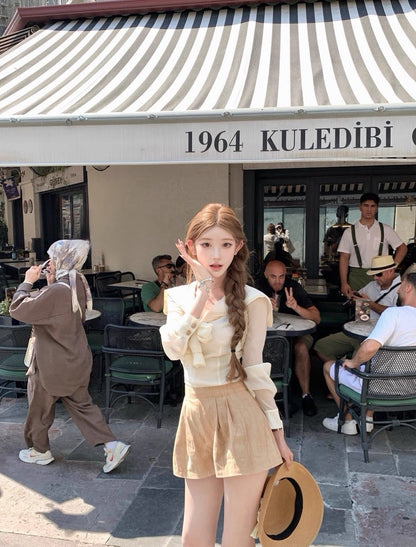 Tue. 卡其圓舞曲手打蝴蝶結翻領襯衫 可愛蛋糕褲裙