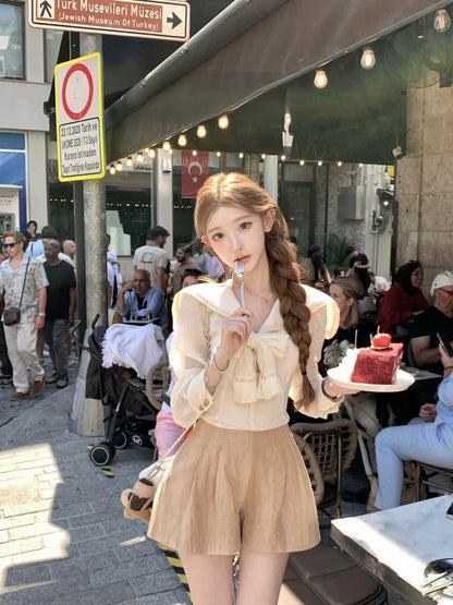 Tue. 卡其圓舞曲手打蝴蝶結翻領襯衫 可愛蛋糕褲裙