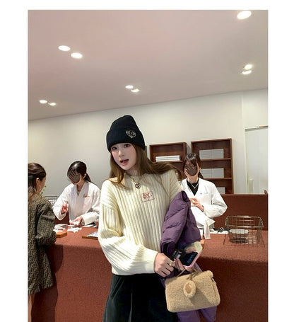 Thu. 麥迪大道小天使刺繡圓領羊毛衣 米