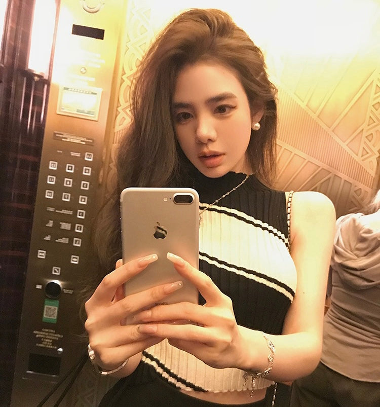 Tue. 旋轉羅紋套頭背心